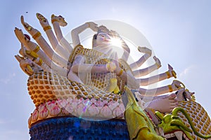 Majestic Multi-Armed Statue in Thailand Under the Sun