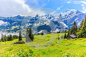 Majestic panoramic view of Eiger, Monch, Jungfrau mountains from Murren-Gimmelwald trail, Swiss alps, Bernese Oberland, Berne