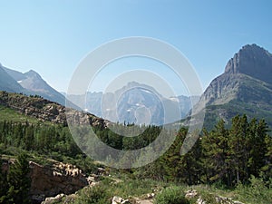 Majestic peaks rise above glacier carved valleys in Glacier National Park