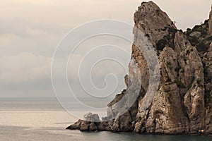 Majestic rocks by the sea at sunset