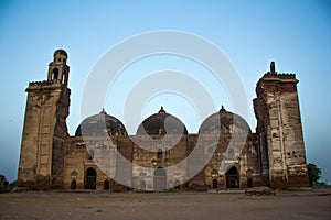 Majestic ruined mosques featuring tracery work, carvings and designs photo
