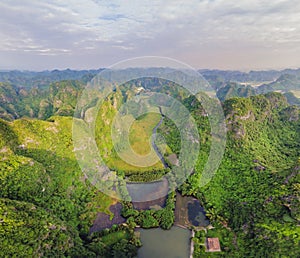 the majestic scenery on Ngo Dong river in Tam Coc Bich Dong view from drone in Ninh Binh province of Viet Nam