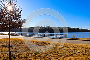 A majestic shot of the still blue lake waters of Lake McIntosh in Peachtree City, Georgia