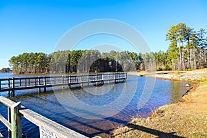 A majestic shot of the still blue lake waters of Lake McIntosh in Peachtree City, Georgia