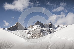 Majestic Snow covered mountains under clouds