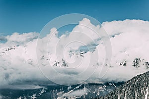 majestic snow-covered mountains and white clouds