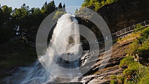 The majestic Steinsdalsfossen is a waterfall located 2 kilometers from the town of Nurheimsund, in the west of Norway