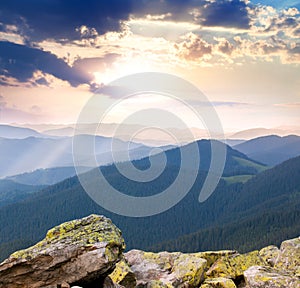 Majestic Sunrise over the mountains with sunbeams