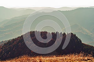 Majestic sunset in mountains landscape. View from high mountain on picturesque landscape autumn Carpathian. Ukraine, Europe