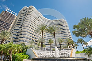 Majestic Towers Condo Bal Harbour Florida with fountain and palm trees in front seen from street photo