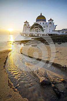 Majestic view of beautiful Malacca Straits Mosque during sunset