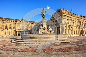 Majestic view of Frankonia fountain and facade of the Wurzburg Residence in Wurzburg, Bavaria, Germany , Europe