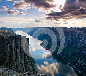 Majestic view of the Lysefjorden, with mountains on the sunset.