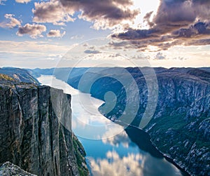 Majestic view of the Lysefjorden, with mountains on the sunset.