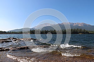 Majestic view of Pikes Peak mountain range seen from Catamount Reservoir in Colorado