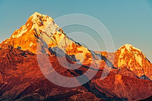 Majestic view of sunset sweeping through Annapurna South and Himchuli from Poon Hill, Ghorepani, Nepal