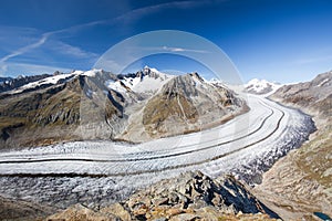 Majestic view to Aletsch glacier, the largest gracier in Alps an photo