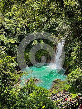 Majestic waterfall in the rainforest jungle of Costa Rica. Tropical hike