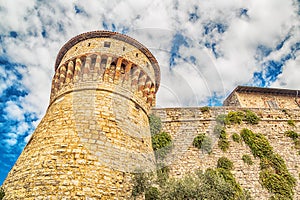 The majestically castle tower on Cidneo Hill in Brescia photo