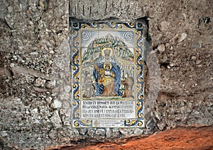 Majolica with an image of Saint Mary from the year 1982 by ceramist Joan Guivernau along the Ave Maria Path in the Basilica.