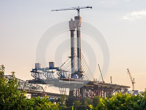 Major bridge construction site at the golden hour, Montreal, quebec, Canada
