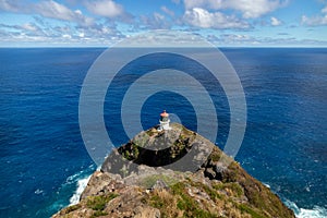 Makapu`u Point Lighthouse looking out over a beautiful blue expanse of ocean, Oahu, Hawaii, USA