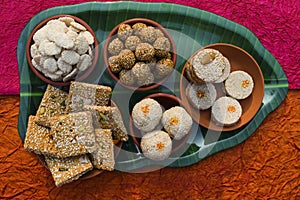 Makar sankranti special cuisine dish items Rewri, Tilgul, Til ke laddu, Chikki, Til baati all sweet items made with white sesame