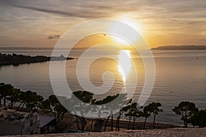 Makarska - Scenic sunset view of Dalmatian archipelago seen from coastal town Makarska, Split-Dalmatia, Croatia, Europe