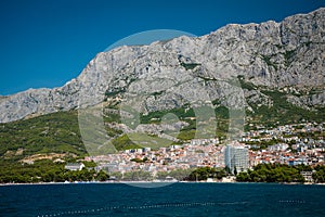 Makarska town with Biokovo mountains in the background, Croatia