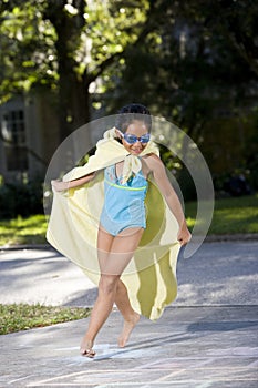 Make-believe, girl in homemade superhero costume