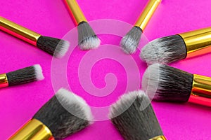 Make brush powder. Drawing cosmetic products isolated on pink ba