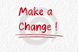 Make a change text with red marker written on white background