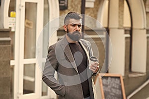 Make this day with coffee. Bearded man enjoying morning coffee. Drinking his cup first thing in morning. Businessman in