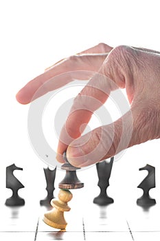 Make decisions and challenge. Chess player makes a move. Man making move with black pawn on chess board