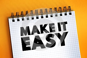 Make It Easy text on notepad, concept background