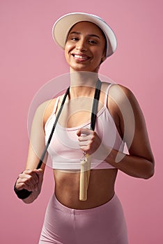 Make fitness a part of your lifestyle. Cropped portrait of an attractive and sporty young woman posing with a skipping