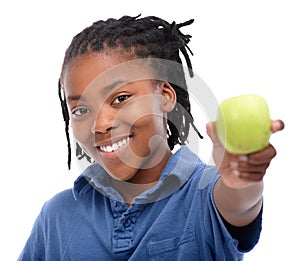 Make the healthy choice. A young AfricanAmerican boy holding an apple. photo