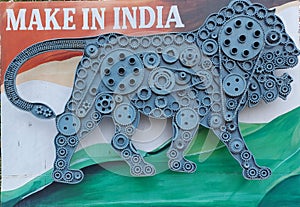 Make In India logo design by waste material photo