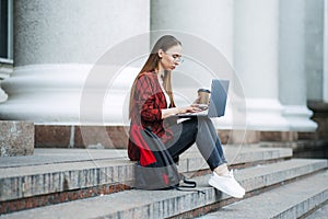 Make money online, blogging, ebusiness. Young woman, freelancer, student girl using laptop photo