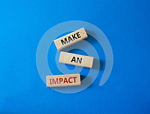 Make a plan symbol. Concept word Make a plan on wooden blocks. Beautiful blue background. Business and Make a plan concept. Copy