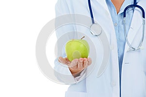 Make sure to get all the vitamins you need. Cropped image of a doctor holding an apple.