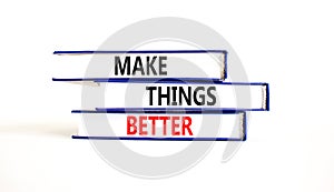 Make things better symbol. Concept words Make things better on books on a beautiful white table white background. Business and