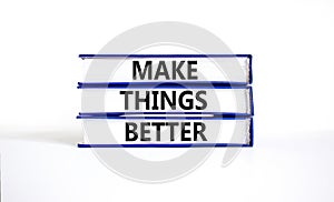 Make things better symbol. Concept words Make things better on books on a beautiful white table white background. Business and