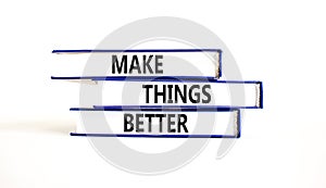 Make things better symbol. Concept words Make things better on books on a beautiful white table white background. Business and