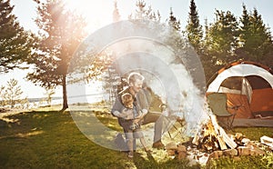 Make time for the great outdoors. a young family camping in the forest.