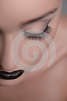 Make-up art. Close-up cropped image of womenï¿½ face with closed