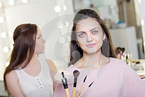 Make-up artist doing make up