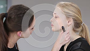 Make-up artist work in her studio