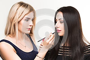 Make-up artist work in her studio.