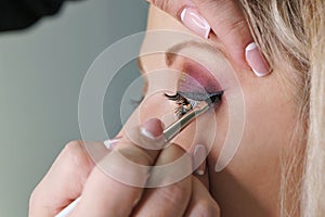 Make up artist working in make up studio, applying makeup